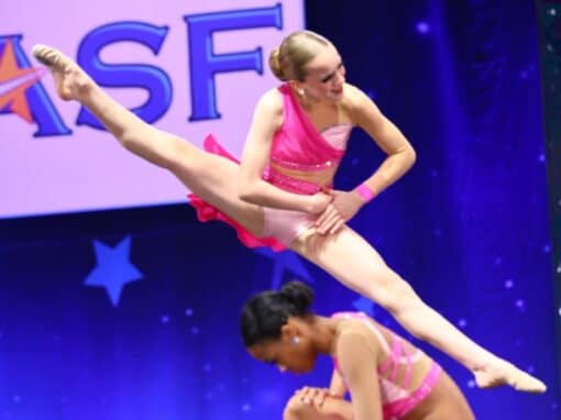 Two young girls performing a dance performance. Two young girls performing a dance performance.