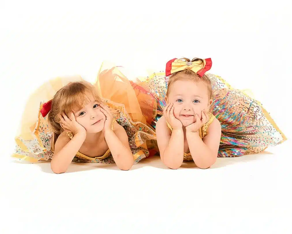 Smiling Young Girls in Colorful Dance Costumes.